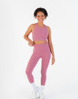 Front view of the Raspberry High-Rise Leggings worn by a model