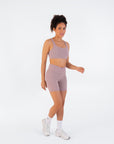 Natural walking pose featuring the Fig Crossover V-Waist Shorts