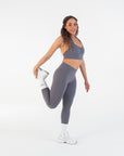 Model stretching in the Chia V-Waist Leggings