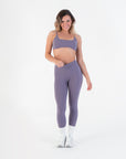 Model standing in the High-Rise Leggings in Acai