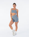 Front view of the Juniper V-Waist Shorts worn by a model